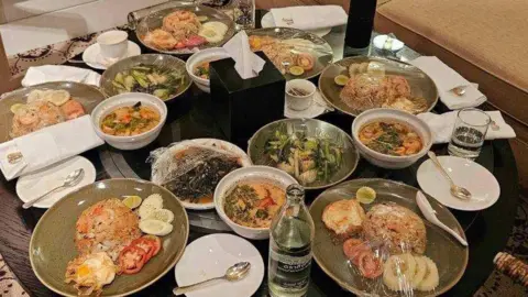 Royal Thai Police Plates of food left untouched in the hotel room