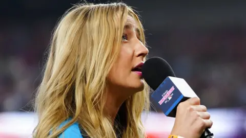 Getty Images Close-up of Ingrid Andress singing into a microphone