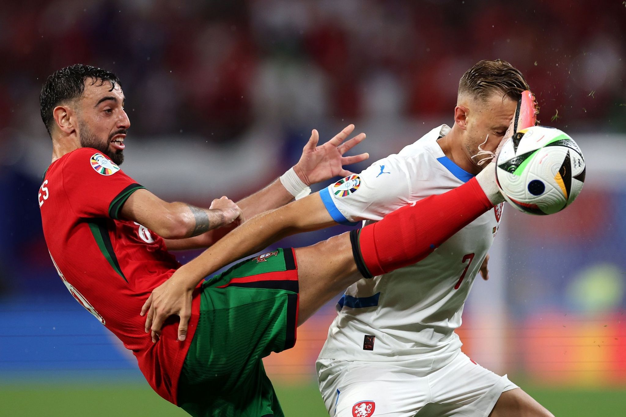 Bruno Fernandes kicks Antonin Barak in the face as they challenge for the ball in the Euro 2024 group match between Portgual and the Czech Republic