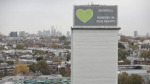 Getty Images A general view of what remains of Grenfell Tower covered with hoardings following a severe fire in June 2017 on October 29, 2019